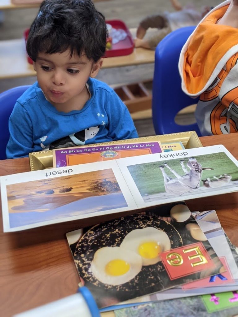 Montessori Student Learning to Read